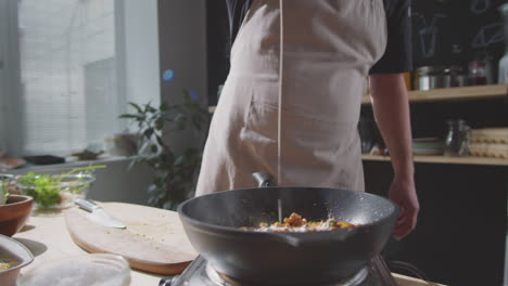 preparing a creamy stir-fry