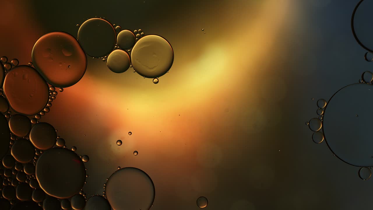 Abstract Colorful Food Oil Drops Bubbles and spheres Flowing