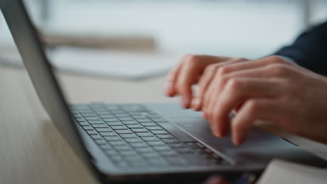 hands inputting data computer working at business tasks closeup. unknown man