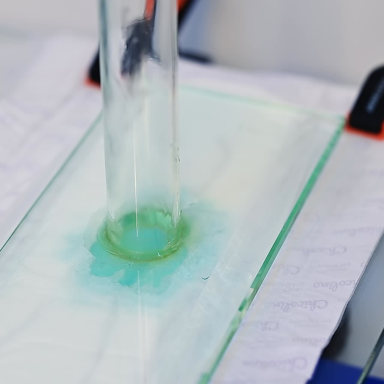 Production of diapers laboratory. Testing the absorbing abilities of diaper layers at the enterprise. Close up