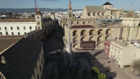 aerial circle view over statue of san rafael in the historic center. cordoba. spain