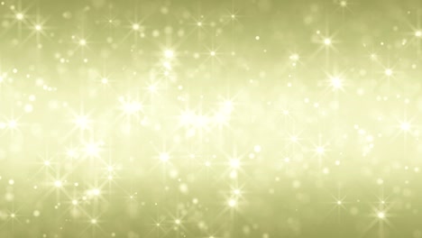 estrellas doradas y partículas de fondo