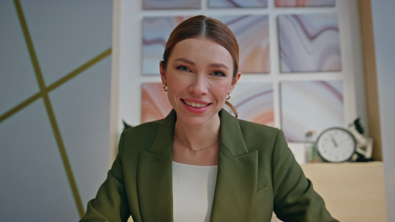 Smiling coach video chatting online business partner closeup. Employee videocall