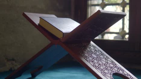 quran on a wooden stand