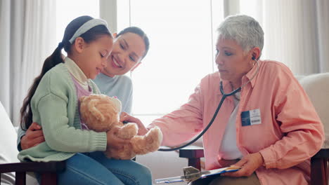 mature doctor, child and stethoscope for teddy