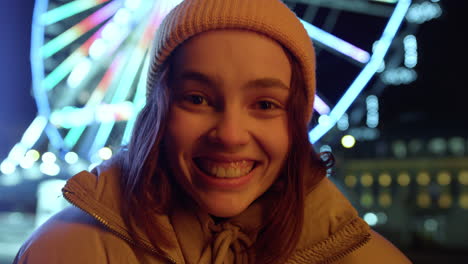 happy woman laughing outdoor. smiling girl looking camera on city street.