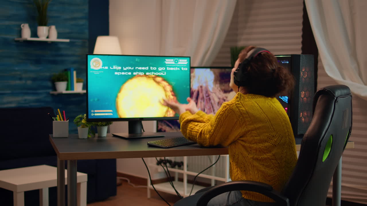 Upset professional woman gamer wearing headset losing shooter game