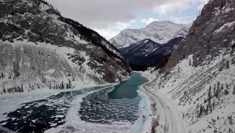 flying over the beautiful bow river in the spray lakes reservoir in canada