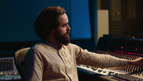 tracking engineer used audio mixer in professional recording studio