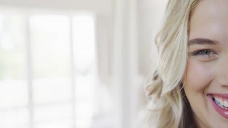 Portrait-of-happy-caucasian-plus-size-woman-at-home-in-slow-motion