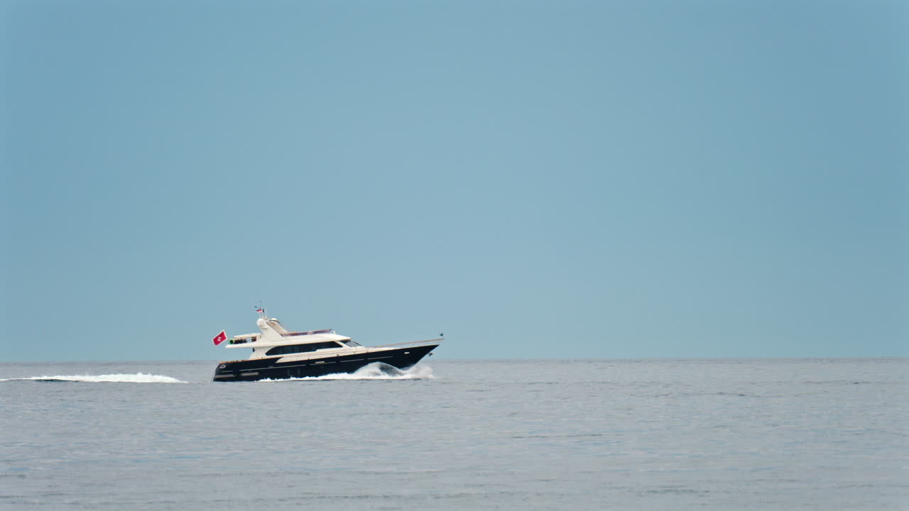 View of a boat moving on the Mediterranean Sea in daylight