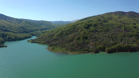 Glittering-Waters-Of-Teleajen-River-Flowing-To-Maneciu-Dam-In-Prahova-County,-Romania