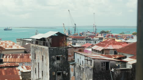 stone town port and aging buildings with ocean view