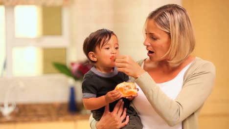 Mother-feeding-her-toddler