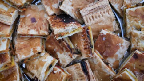 Detail-of-Galician-empanada-cut-and-presented-in-degustation-event