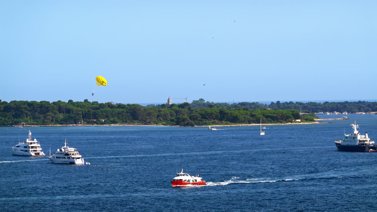 Boats moving on the sea in the evening in Cannes, France