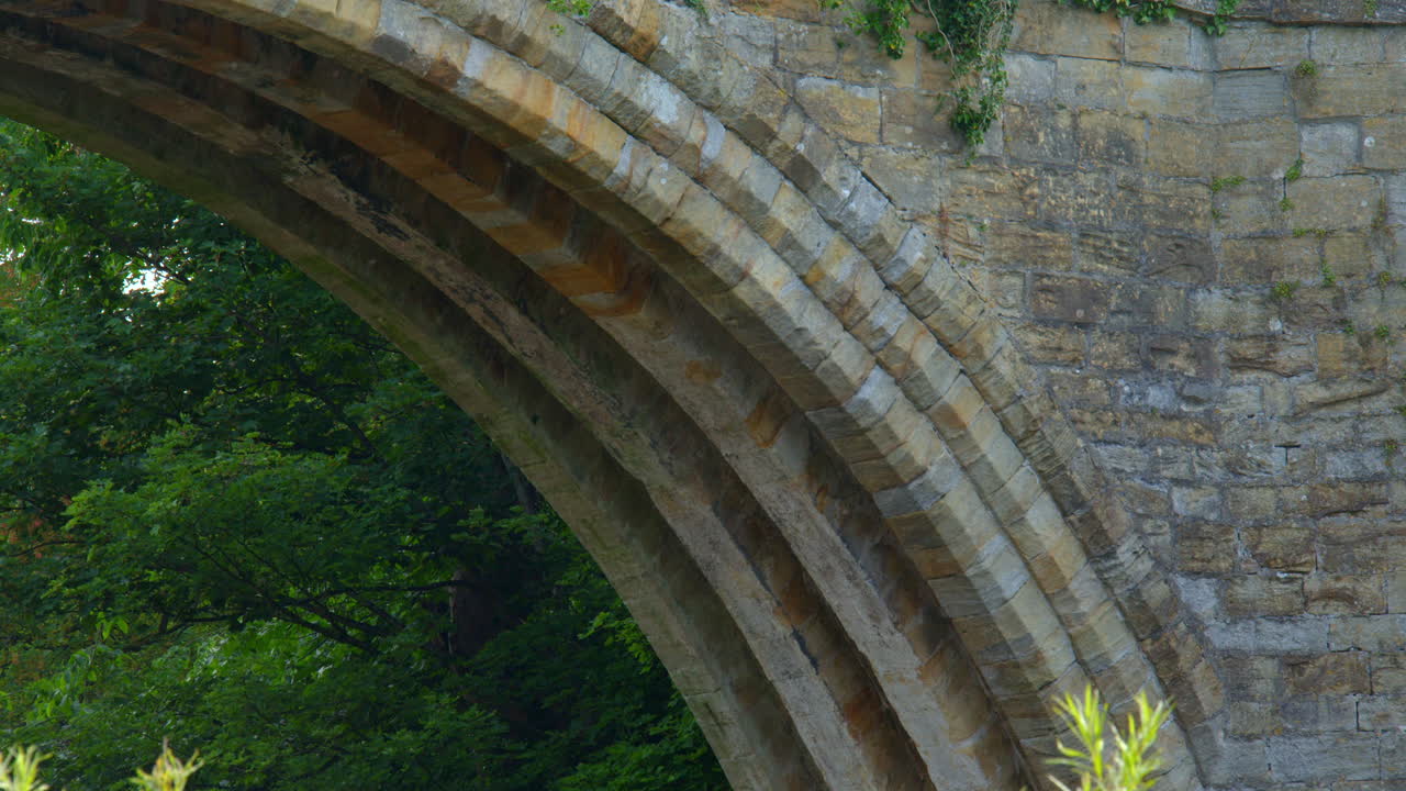 Mid shot of the West arch on the South facing side of the Devils bridge at Kirkby Lonsdale, North Yorkshire