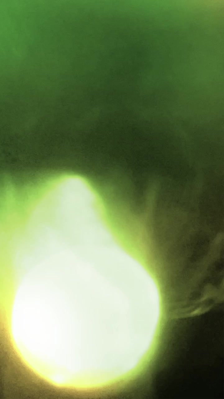 Abstract Light Leaks and Lens Flares in Green and Gold