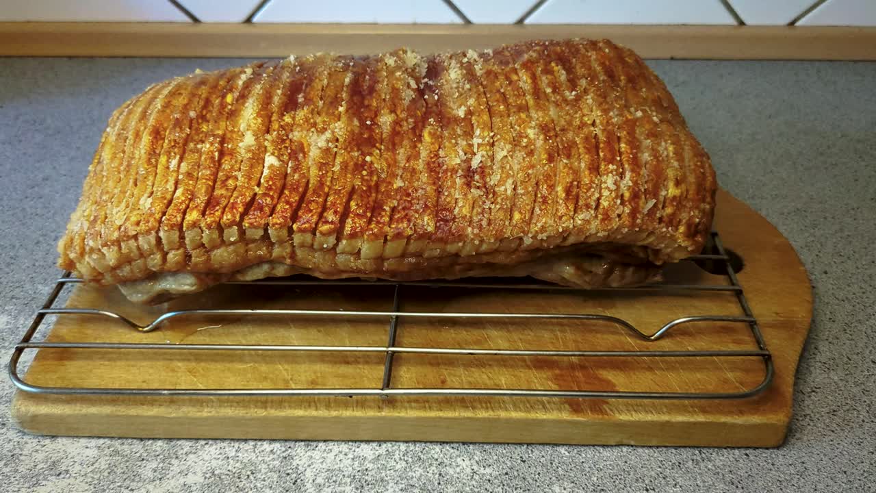 4K60 Delicious Danish Christmas Food Traditional Danish Pork Roast With Crackling - Handheld Shot