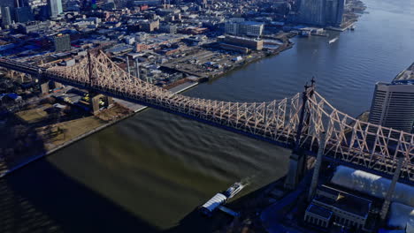 queensboro bridge, manhattan, new york city, during the day in winter