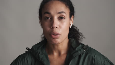 african american happy woman over white background.