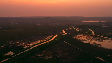 Aerial-View-Of-Creeks,-Field-And-Salt-Flat-In-Rural-Area-Of-Vasai-Mumbai-At-Sunset-In-India