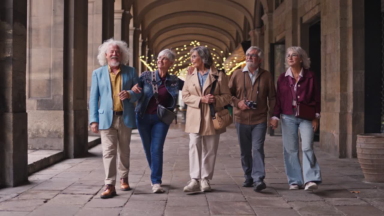 Group of senior tourists walking in a city