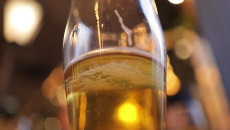 glass of light beer on a pub.