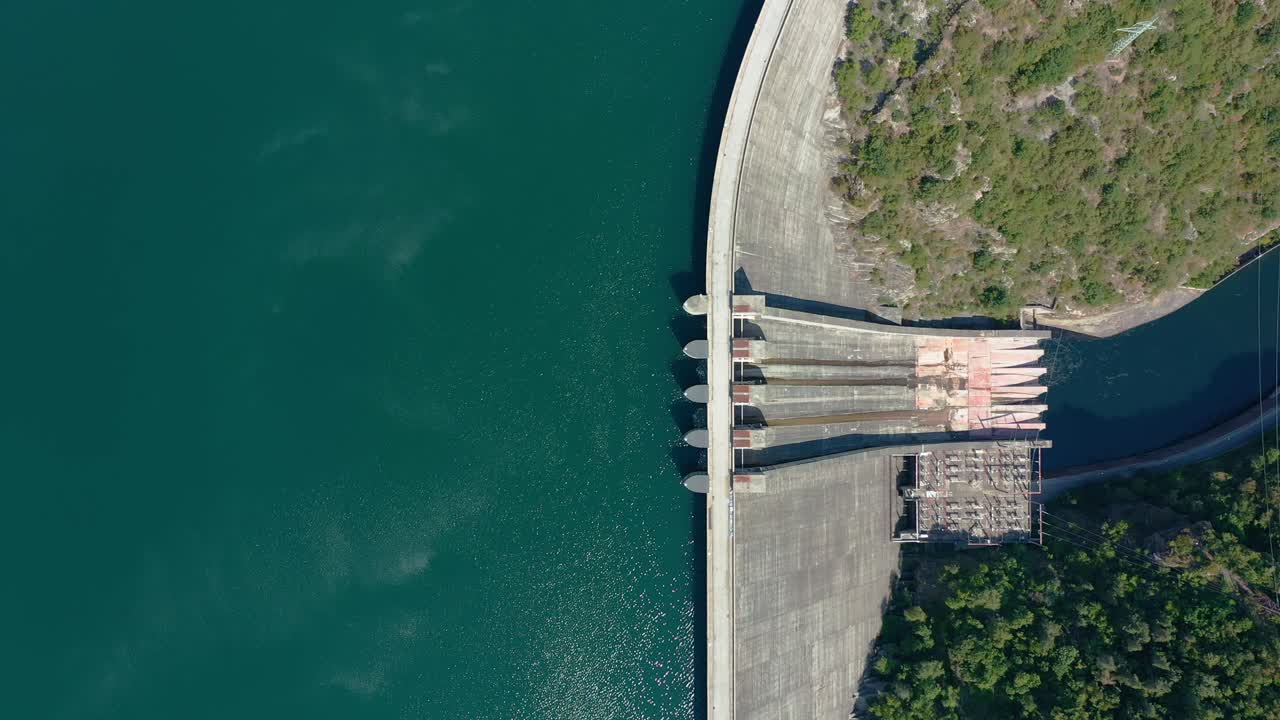 Aerial View of a Hydroelectric Dam and Reservoir