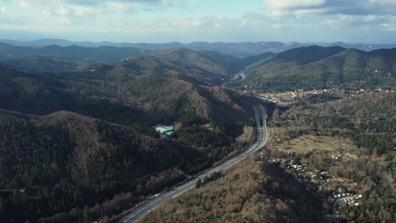 Highway Winding Through Mountainous Landscape