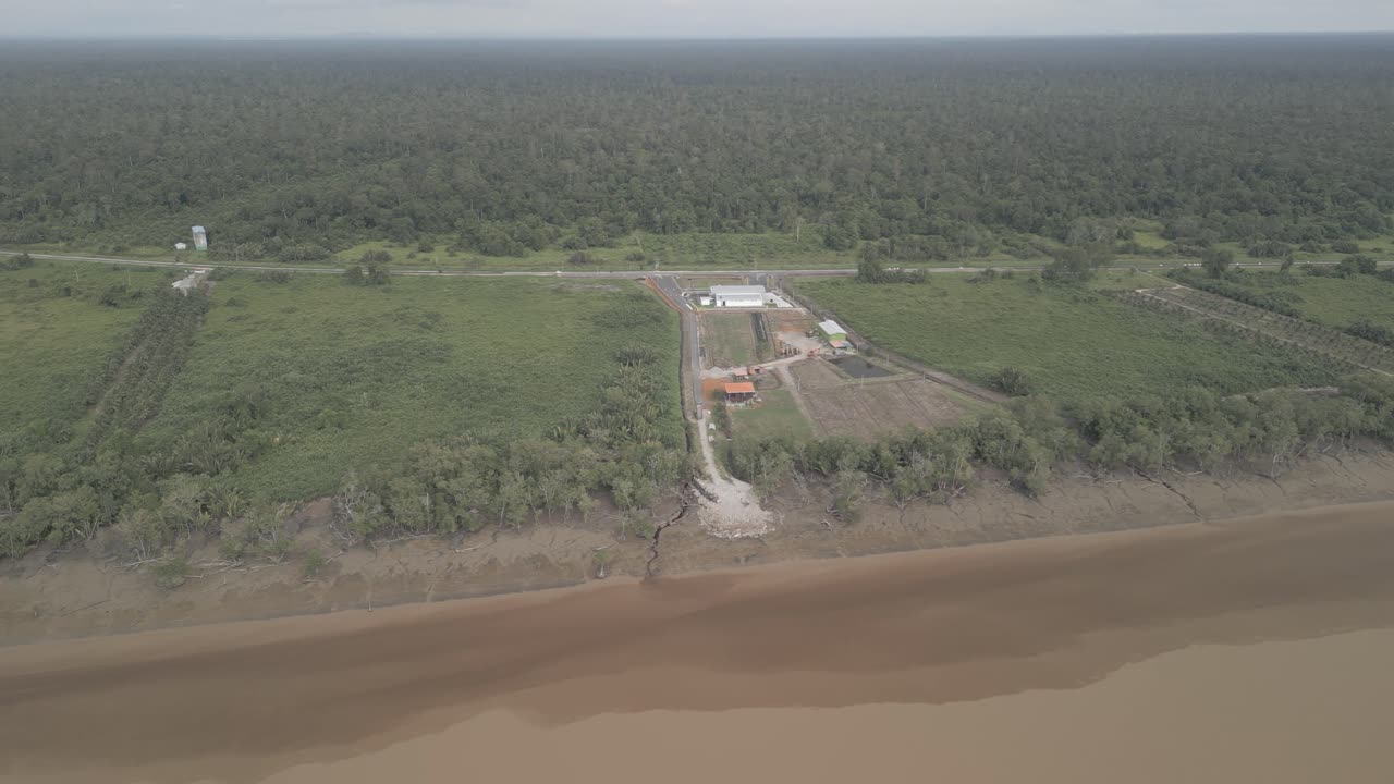 Aerial Drone View A Petrol Station On The Way To Batang Lupar Ferry Terminal And To The New Bridge Project Under Construction,When Complete Will Conected Both Side For Transportation