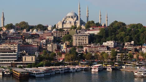 aerial view above eminonu pier - ferry boat harbour on beautiful summer day