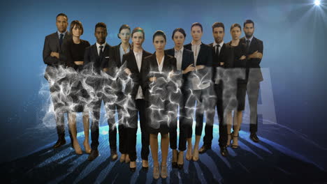 team of businesspeople standing with arms crossed