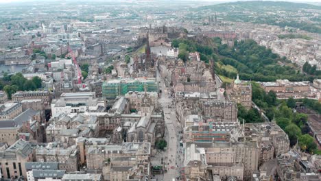 Dolly-forward-drone-shot-up-the-Royal-mile-towards-Edinburgh-Castle