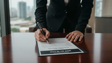 professional businessman signing important document in modern office setting, highlighting commitment and responsibility of agreements with legal implications