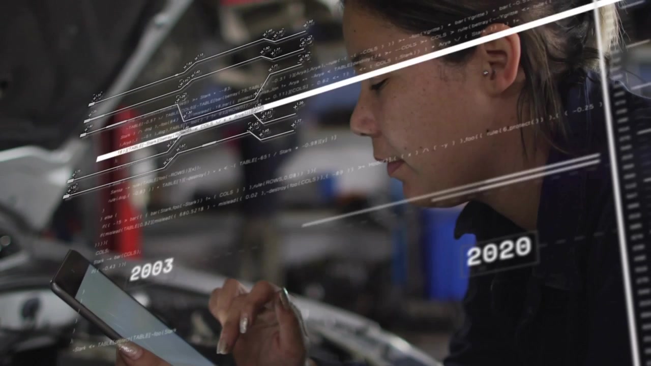 Automotive technician tapping tablet, starting animated timeline over engine tracking fault history