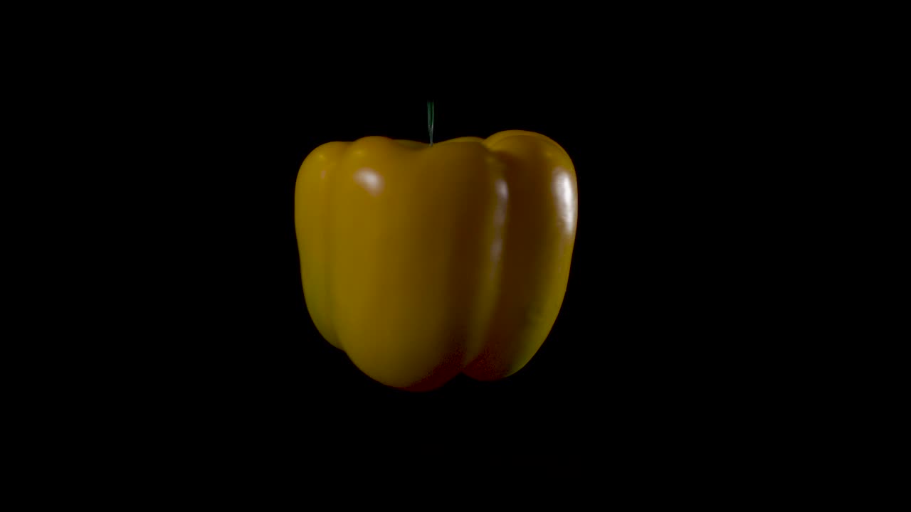 pimiento amarillo orgánico fresco se enciende en el fondo del estudio negro