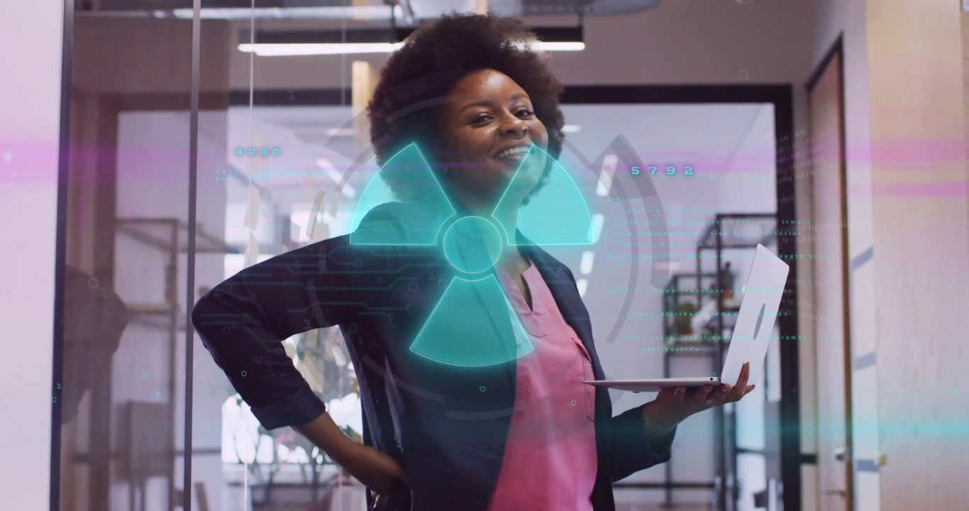 Woman supporting laptop and tapping, activating cyan hologram emblem, presenting business, smiling