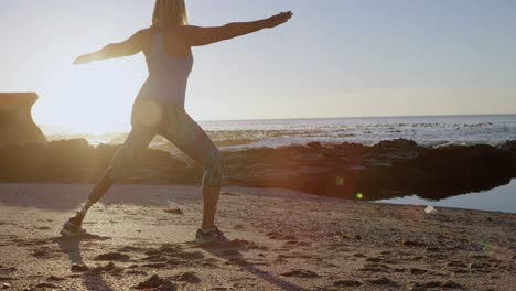 disabled woman exercising in the beach 4k