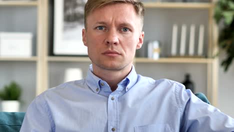 portrait of amazed, surprised businessman wondering