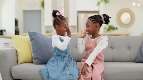 Kids,-high-five-and-couch-in-a-home-with-young