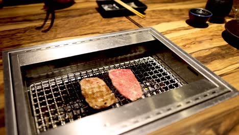 steaks cooking on a grill over time