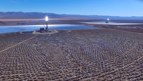 a beautiful aerial over a vast concentrated solar power farm in the mojave desert 6