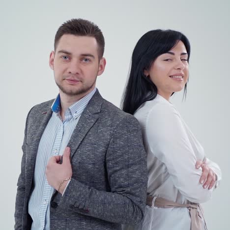 partners leaning back to back