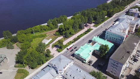 aerial view of a city with river and park