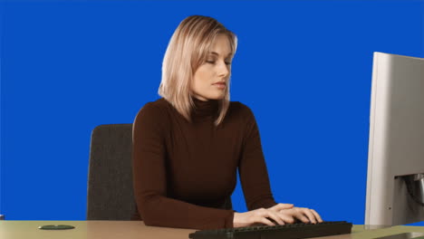 blue screen of a woman at computer