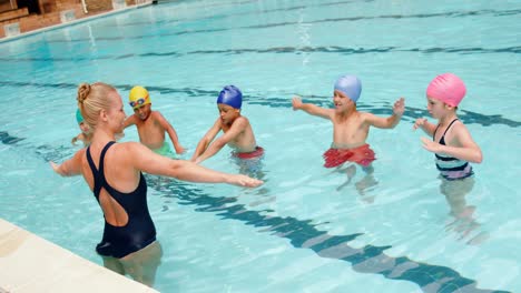 female trainer training her young students