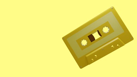 yellow cassette tape isolated on a yellow text space.