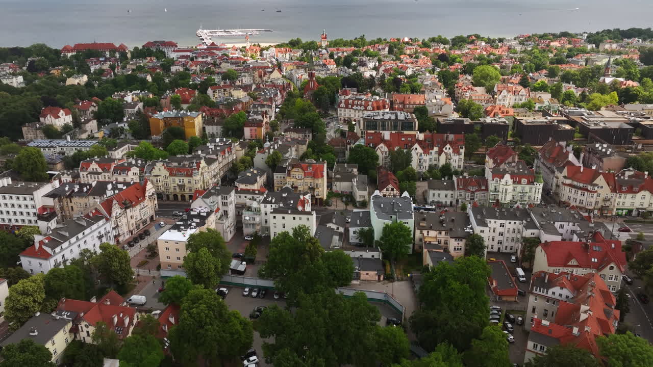 Aerial view rotating over the downtown of Sopot city, summer day in Poland
