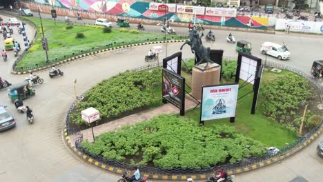 a large circle is visible with many vehicles returning to it